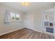 Bedroom featuring wood-look flooring and a closet at 11451 82Nd Ave, Seminole, FL 33772