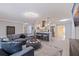 Bright and airy living room open to the modern kitchen, featuring comfortable seating and stylish accents at 11451 82Nd Ave, Seminole, FL 33772