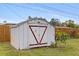 Outdoor shed in backyard, offering extra storage space at 11451 82Nd Ave, Seminole, FL 33772