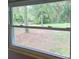 Beautiful view of the large backyard from a double hung window at 2152 Mckinley St, Clearwater, FL 33765