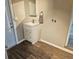 Practical bathroom featuring a modern vanity with drawers and neutral color palette at 2152 Mckinley St, Clearwater, FL 33765
