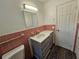 Bathroom featuring a sink vanity, and ceramic tile at 2152 Mckinley St, Clearwater, FL 33765