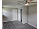 Cozy bedroom with soft carpeting, a ceiling fan, and closet space at 2152 Mckinley St, Clearwater, FL 33765