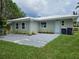Charming home featuring a well-maintained exterior, beautiful landscaping and a spacious yard at 2152 Mckinley St, Clearwater, FL 33765