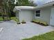 Charming home featuring a well-maintained exterior, beautiful landscaping and a spacious yard at 2152 Mckinley St, Clearwater, FL 33765