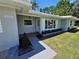 Charming single-story home with a well-manicured lawn and inviting front entrance at 2152 Mckinley St, Clearwater, FL 33765