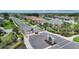 Welcoming community entrance with decorative gates, landscaping, and signage for a premier neighborhood at 2226 Charleston Park Dr, North Port, FL 34287