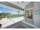 Inviting screened pool area with serene water views and a covered patio, perfect for relaxation at 2226 Charleston Park Dr, North Port, FL 34287