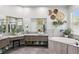 Spa-like main bathroom with double vanity, soaking tub, and elegant decor at 23346 Abercorn Ln, Land O Lakes, FL 34639