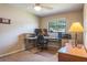 Bedroom used as an office with a computer and a view of the outside at 2421 Eagle Chase Dr, Palm Harbor, FL 34683