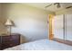 Bedroom with neutral colored walls, a ceiling fan and carpeted floors at 2421 Eagle Chase Dr, Palm Harbor, FL 34683