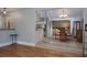 Open-concept dining area with hardwood floors, seamless flow to living spaces, and abundant natural light at 2421 Eagle Chase Dr, Palm Harbor, FL 34683