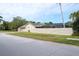 Lovely single-story home with a screened lanai, attached garage, and privacy fence at 2421 Eagle Chase Dr, Palm Harbor, FL 34683