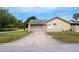 Attached two-car garage on a well-maintained property with a private front entrance at 2421 Eagle Chase Dr, Palm Harbor, FL 34683