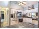 Bright kitchen featuring stainless steel appliances, granite countertops, and natural light at 2421 Eagle Chase Dr, Palm Harbor, FL 34683