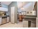 Bright kitchen features tile floors, granite counters, and stainless steel dishwasher at 2421 Eagle Chase Dr, Palm Harbor, FL 34683
