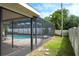 The screened-in patio includes an in-ground pool and plenty of space for outdoor enjoyment at 2421 Eagle Chase Dr, Palm Harbor, FL 34683
