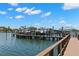 This waterfront property features a private boat dock with multiple boat slips for easy water access at 3805 Gulf Blvd # 401, St Pete Beach, FL 33706