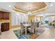 This dining area features comfortable seating for six, modern decor, and access to the kitchen and living area at 3805 Gulf Blvd # 401, St Pete Beach, FL 33706