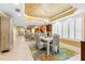 The dining and kitchen areas are open concept, offering seamless flow and plenty of room for gathering at 3805 Gulf Blvd # 401, St Pete Beach, FL 33706