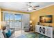 A sunlit living room offers waterfront views, comfortable seating, and stylish decor, perfect for relaxation at 3805 Gulf Blvd # 401, St Pete Beach, FL 33706