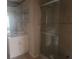 Bathroom featuring a modern vanity, and glass-enclosed shower at 5125 Puritan Cir # 1103, Tampa, FL 33617
