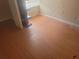 Cozy bedroom featuring wood-look flooring, natural light, and outlets at 5125 Puritan Cir # 1103, Tampa, FL 33617