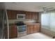 Updated kitchen featuring stainless steel appliances, tile flooring, and lots of cabinet space at 5125 Puritan Cir # 1103, Tampa, FL 33617