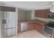 Bright kitchen with stainless steel appliances, ample cabinetry, and modern finishes at 5125 Puritan Cir # 1103, Tampa, FL 33617