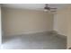 Interior view of a living room featuring fan and bright lighting at 5125 Puritan Cir # 1103, Tampa, FL 33617