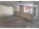 Open-concept living space featuring mirrored walls, ready for your design vision and renovations at 5125 Puritan Cir # 1103, Tampa, FL 33617
