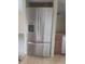 Stainless steel refrigerator with water dispenser in a well lit kitchen at 5125 Puritan Cir # 1103, Tampa, FL 33617