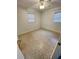 An unfurnished bedroom featuring two windows and terrazzo flooring at 7026 20Th N St, St Petersburg, FL 33702
