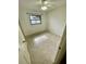 A simple bedroom with a window and overhead fan at 7026 20Th N St, St Petersburg, FL 33702