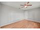 Neutral bedroom featuring wood floors, ceiling fan, and a closet at 7108 14Th Nw Ave, Bradenton, FL 34209