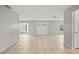 Bright living room features tile floors, neutral paint, and large windows for ample natural light at 7108 14Th Nw Ave, Bradenton, FL 34209