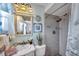 Bathroom featuring tile flooring, shower, mirror, lights, toilet and sink at 7619 Limington Dr, Port Richey, FL 34668