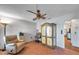 Cozy bedroom featuring a ceiling fan and closet at 7619 Limington Dr, Port Richey, FL 34668