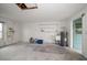 Spacious garage features a utility sink, water heater, and ample storage shelving at 911 Sago Palm Way Way, Apollo Beach, FL 33572