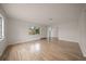 Spacious living room with natural light, showcasing beautiful floors and open floor plan at 911 Sago Palm Way Way, Apollo Beach, FL 33572