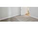 Bedroom featuring neutral carpet and an open doorway, creating a versatile space for rest and relaxation at 15003 Rider Pass Dr, Lithia, FL 33547