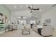 Open living area showcasing seamless flow between the living room, kitchen, and dining spaces at 2908 Longbrooke Way, Clearwater, FL 33760