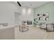 Bright living room featuring a modern fireplace, light wood floors, and contemporary decor at 2908 Longbrooke Way, Clearwater, FL 33760