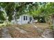 Backyard with view of home, shed, and ample space at 3105 N 16Th St, Tampa, FL 33605