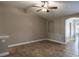 Bonus room with light-colored walls and tile flooring at 3298 Covered Bridge W Dr, Dunedin, FL 34698