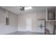 The garage features a garage door opener, storage closet, and a water heater at 3298 Covered Bridge W Dr, Dunedin, FL 34698