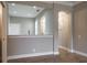 Eat-in kitchen with stainless steel sink, white appliances, and light-filled view at 3298 Covered Bridge W Dr, Dunedin, FL 34698