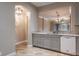 Gourmet kitchen showcasing stainless steel appliances, gray cabinetry, and modern design at 3298 Covered Bridge W Dr, Dunedin, FL 34698