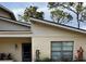 Charming home exterior featuring a well-manicured lawn and stucco facade at 3610 54Th W St # B8, Bradenton, FL 34209