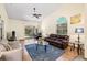 Inviting living room with vaulted ceilings and ample natural light, featuring sliding glass doors at 3810 Darston St, Palm Harbor, FL 34685